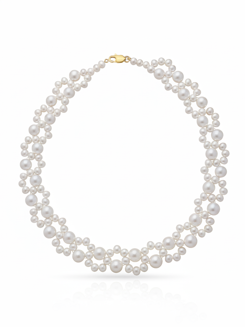 Pearl necklace with a gold clasp on a white background